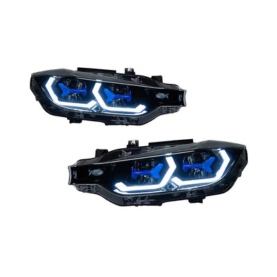 Deux phares LED BMW F30 avec chevrons blancs allumés et inserts bleus