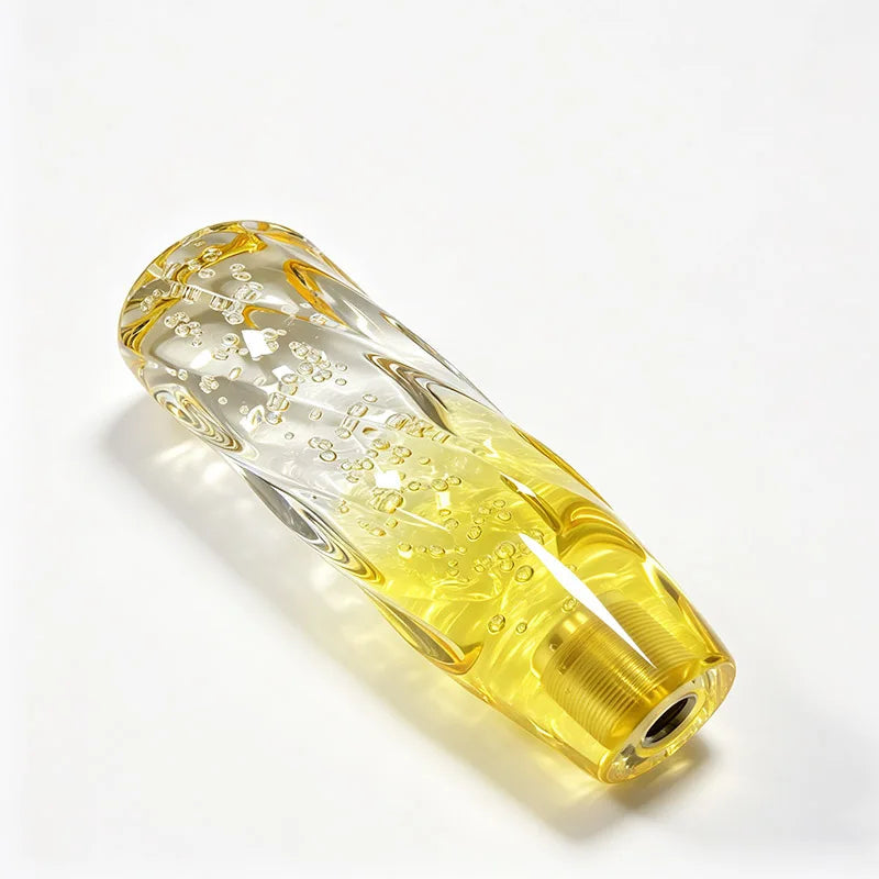 Pommeau de vitesse transparent jaune à bulles d'air