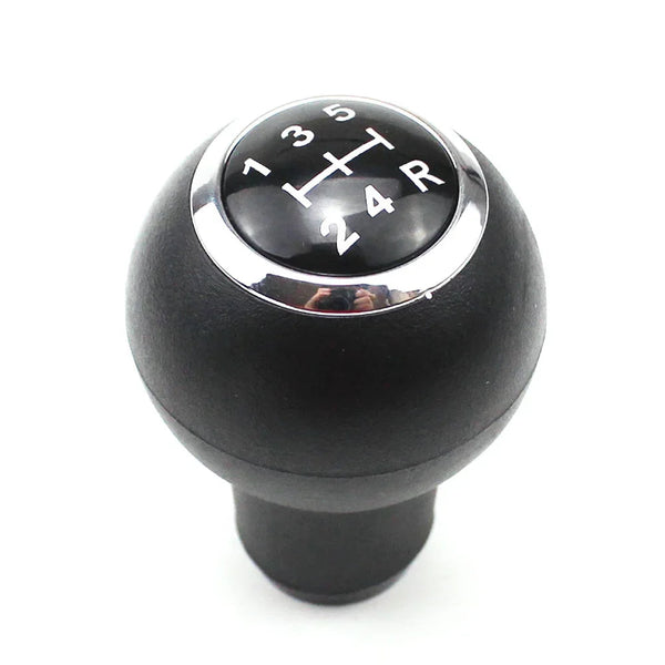 Pommeau de vitesse Kia Cerato, boule noire cerclée de chrome et grille 5 vitesses