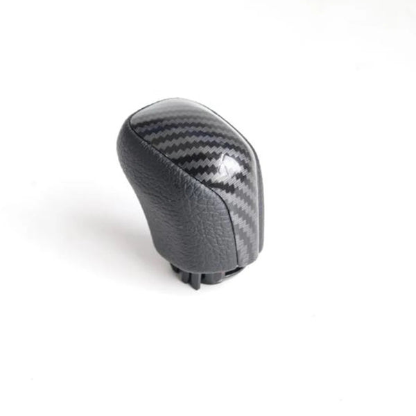 Pommeau de vitesse Toyota Yaris Cross noir mat avec effet carbone sur la partie centrale pour boîte automatique