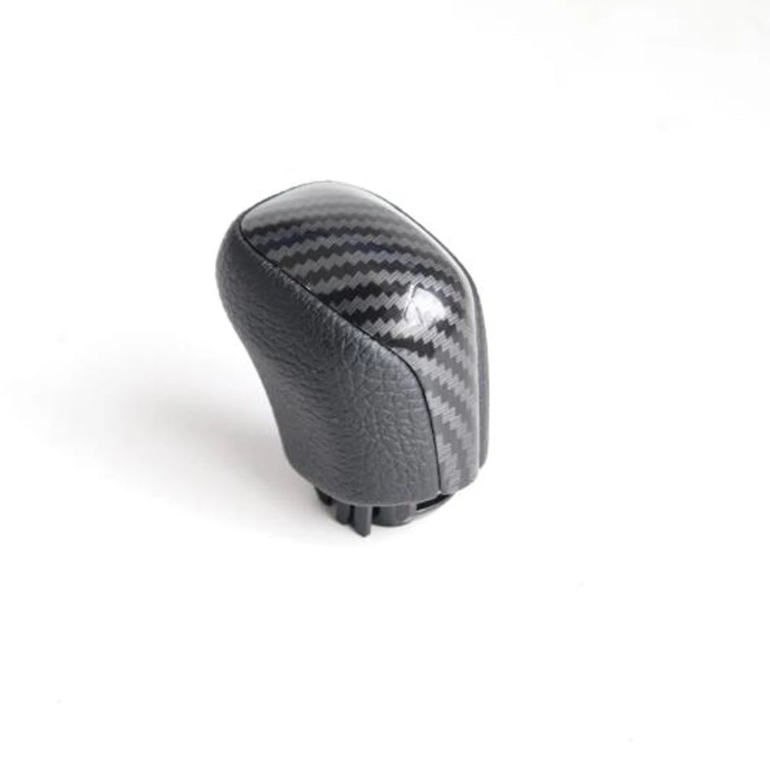 Pommeau de vitesse Toyota Yaris Cross noir mat avec effet carbone sur la partie centrale pour boîte automatique