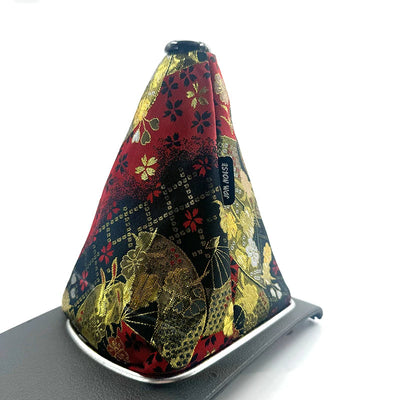 Soufflet de levier de vitesse JDM motif C, éventails et fleurs de cerisier dorés sur fond rouge