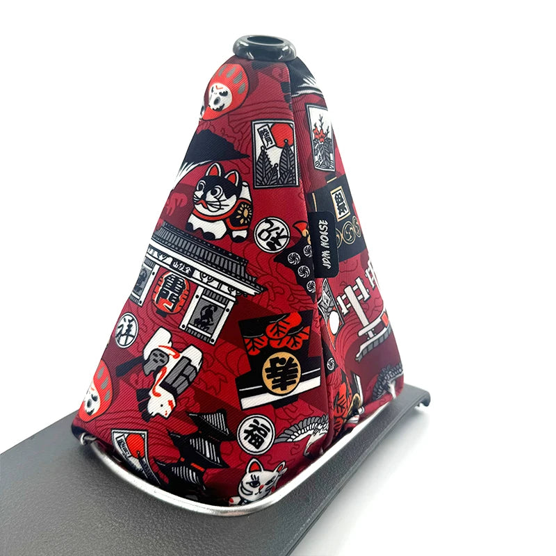 Soufflet de levier de vitesse JDM motif L, chats maneki-neko et daruma sur fond rouge