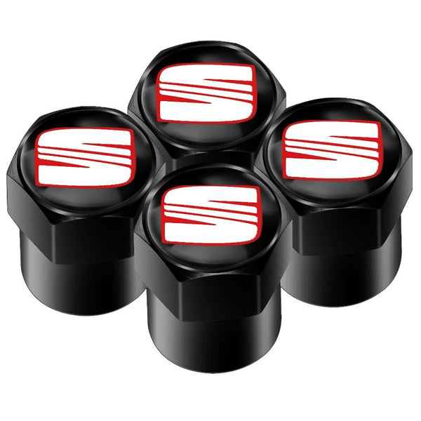 Bouchons de valve Seat noirs, les quatre capuchons hexagonaux au logo de la marque