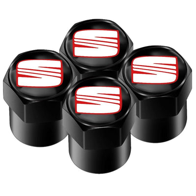 Bouchons de valve Seat noirs, les quatre capuchons hexagonaux au logo de la marque