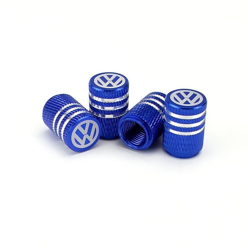 bouchon de valve Volkswagen de couleur bleu, avec logo Volkswagen inscrit sur le dessus.