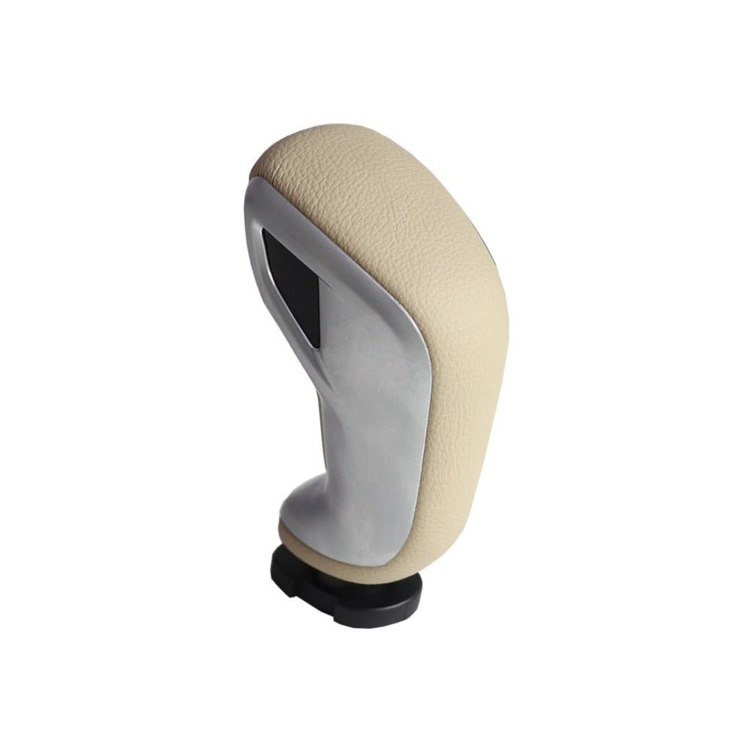 Levier de vitesse C5 automatique. De couleur beige.