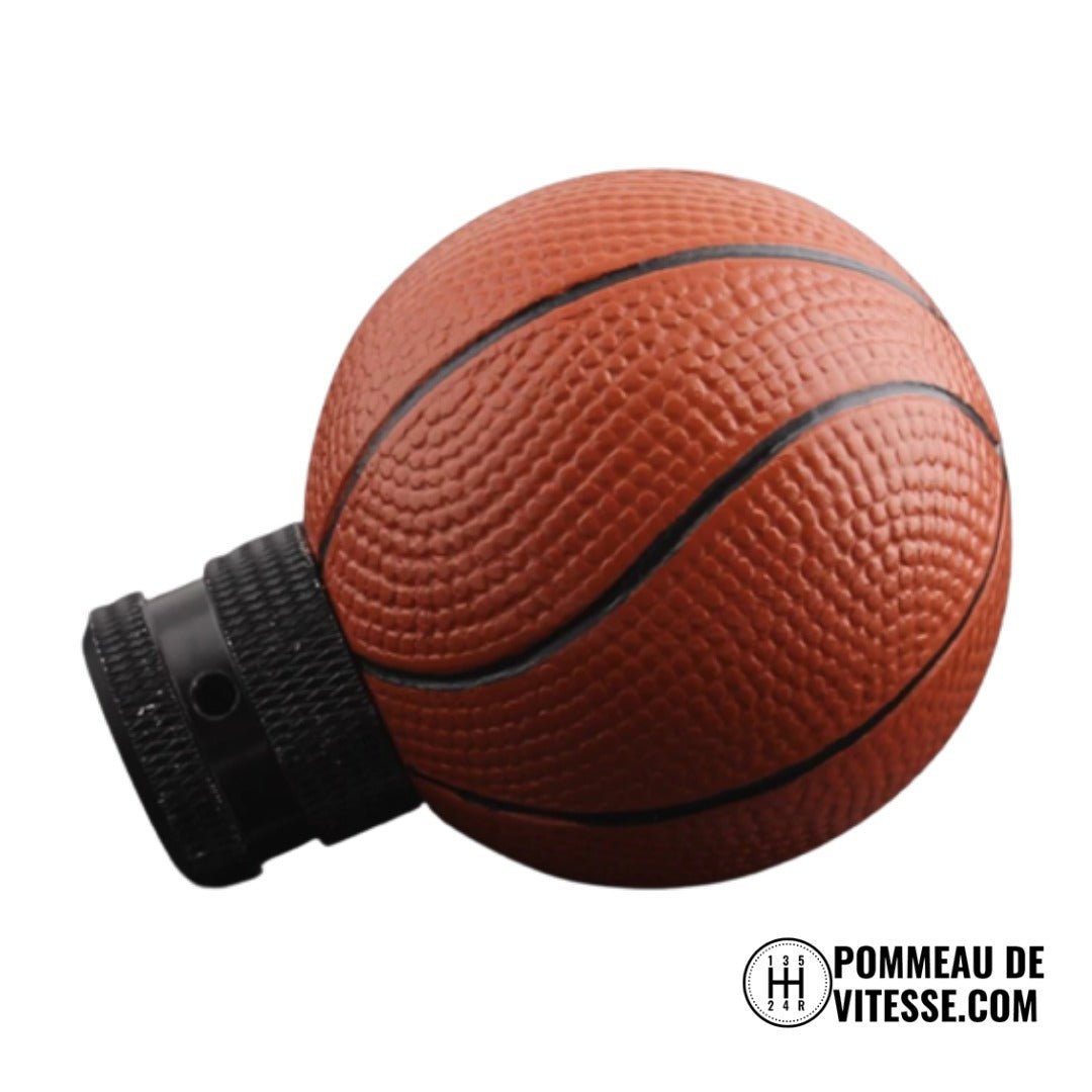 Pommeau de vitesse ballon de basket posé sur le côté, détail des lignes noires et de l'adaptateur moleté