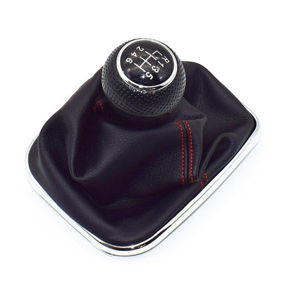 Pommeau de vitesse Golf 4 vu de face, soufflet noir surpiqué rouge et entourage chromé