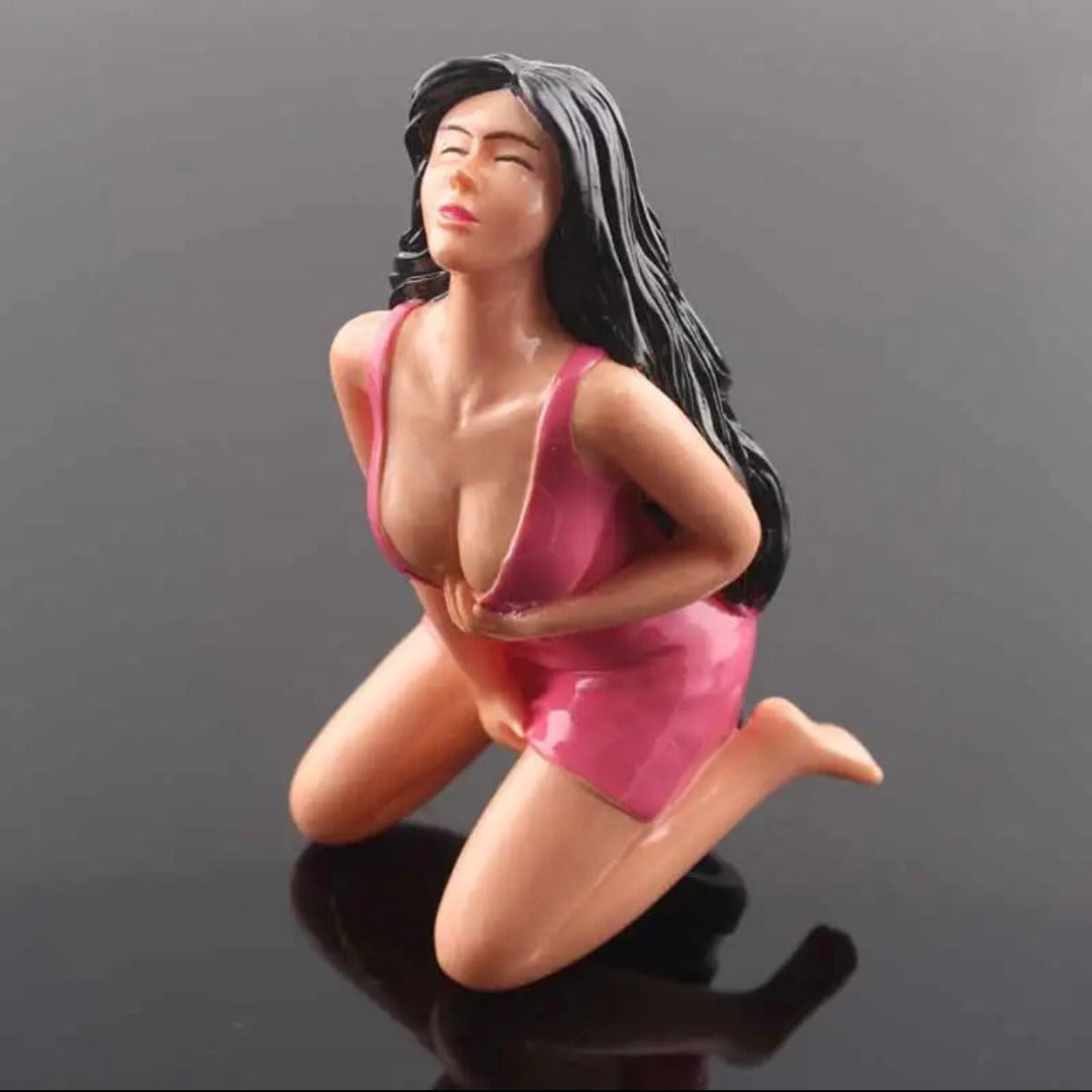 Pommeau de vitesse en forme de mannequin, couleur rose.