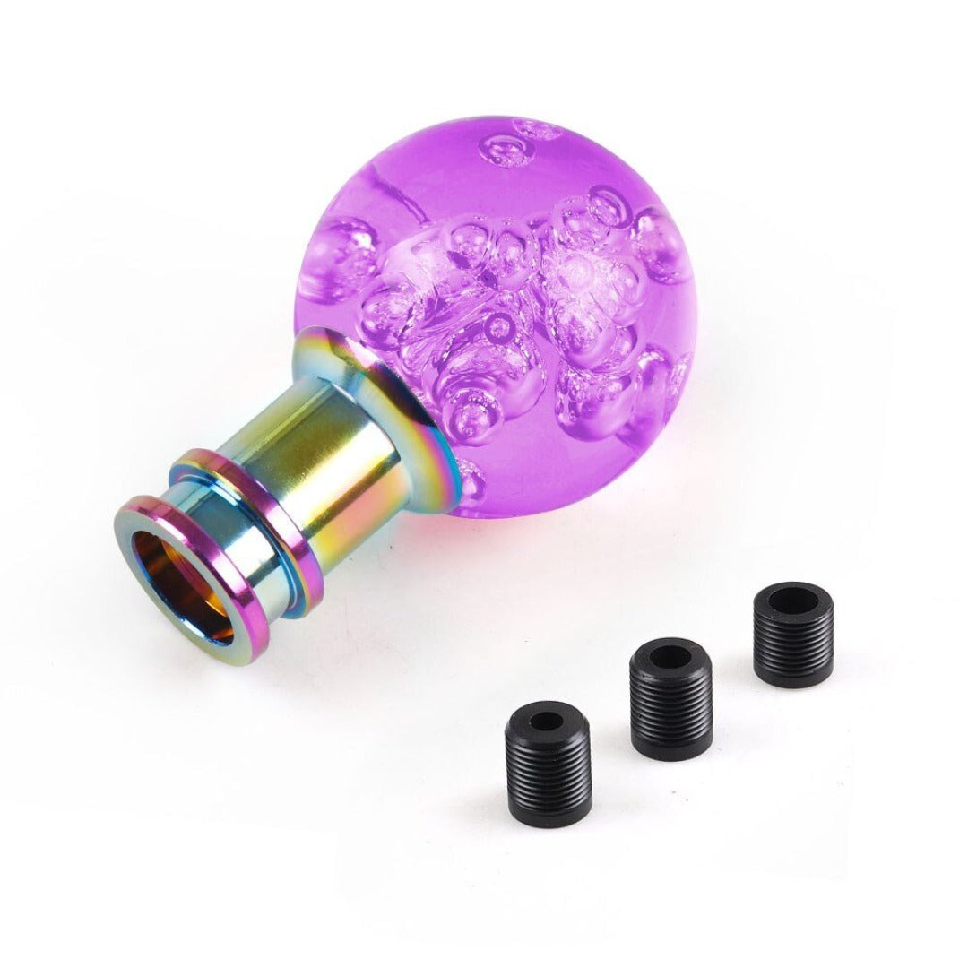 Pommeau de vitesse original en forme de boule, de couleur violet.