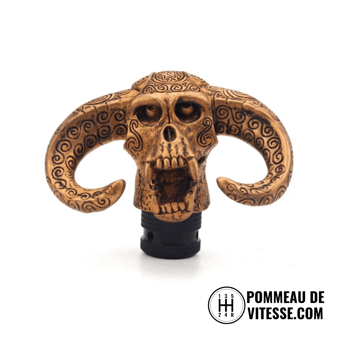 Pommeau de vitesse original, en forme de tête de vache et de couleur jaune.